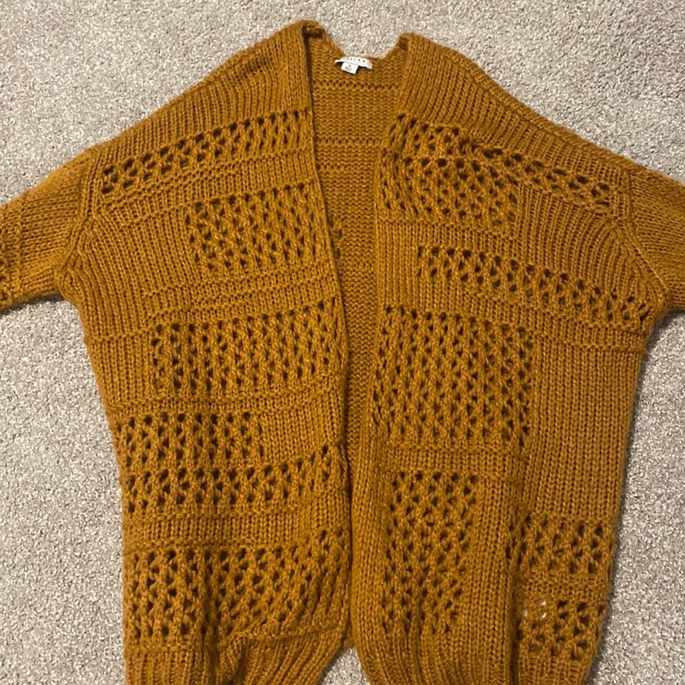 Favlux cardigan fits like a large on me